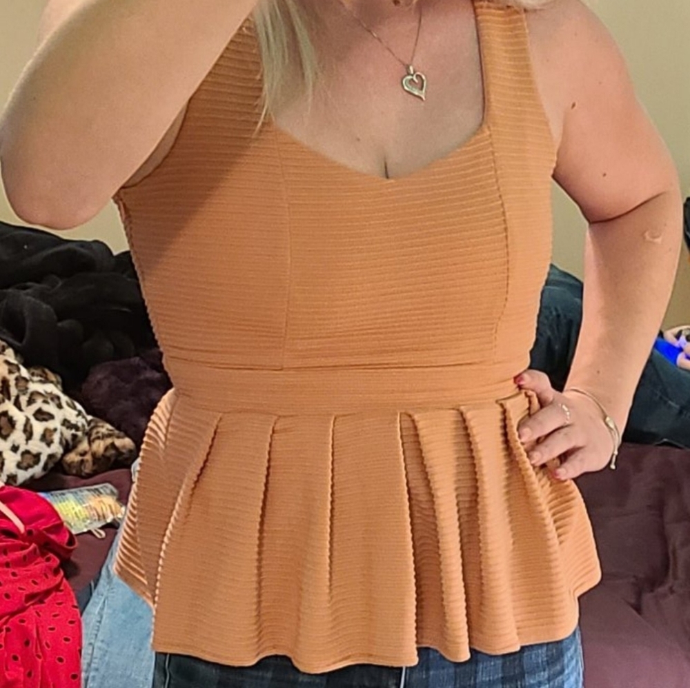ANGL peplum back heart cutout top size Medium